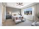 Serene main bedroom featuring a neutral palette, soft lighting, and large window at 44409 N 43Rd Dr, Phoenix, AZ 85087