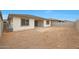 Wide shot of the backyard showcasing the potential for landscaping and outdoor activities at 44717 N 44Th Dr, Phoenix, AZ 85087