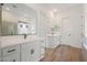 Elegant bathroom featuring double sinks, spacious vanities, and modern fixtures at 44717 N 44Th Dr, Phoenix, AZ 85087