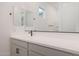 Modern bathroom featuring double sinks, a large mirror, and sleek black fixtures at 44717 N 44Th Dr, Phoenix, AZ 85087