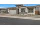 Beautiful home featuring stone accents, and a well maintained lawn at 44717 N 44Th Dr, Phoenix, AZ 85087