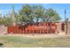 Sendero Crossing community sign featuring a modern fence and landscaping at 44721 N 44Th Dr, Phoenix, AZ 85087