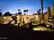 Exterior of the property at night with illuminated landscaping and architectural details at 5682 N Scottsdale Rd, Paradise Valley, AZ 85253