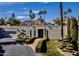 Contemporary home featuring manicured landscaping, mountain views and a private driveway at 5682 N Scottsdale Rd, Paradise Valley, AZ 85253