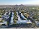 Expansive aerial view of the community showcasing lush landscaping and neighborhood at 6125 E Indian School Rd # 216, Scottsdale, AZ 85251