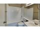 Bright bathroom featuring a white vanity, mirrored medicine cabinet, and a shower-tub combination at 625 S Westwood St # 108, Mesa, AZ 85210