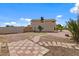 Large backyard featuring tile walkways and space for gardening or landscaping at 6915 E Gary Cir, Mesa, AZ 85207