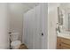 Bathroom featuring a toilet, walk-in shower and vanity with ample storage at 6915 E Gary Cir, Mesa, AZ 85207