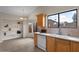 Dining area with tile flooring, natural light, and built-in shelving at 6915 E Gary Cir, Mesa, AZ 85207