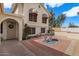 Covered patio area offers great space for outdoor dining and relaxation, complete with a seating area at 6915 E Gary Cir, Mesa, AZ 85207