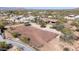 Desert home featuring a fenced horse arena with desert views and multiple outbuildings at 7100 E Montgomery Rd, Scottsdale, AZ 85266