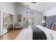 Bright main bedroom with vaulted ceiling, walk-in closet, and neutral decor at 7100 E Montgomery Rd, Scottsdale, AZ 85266