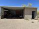 Open-air shed featuring ample storage and space for tools and equipment on a gravel lot at 7100 E Montgomery Rd, Scottsdale, AZ 85266