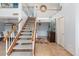 Staircase showcasing natural wood, white risers, and an open layout leading to the second floor at 7100 E Montgomery Rd, Scottsdale, AZ 85266