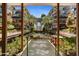 Beautiful view of the courtyard featuring lush landscaping, a water feature, and connecting walkways at 7121 E Rancho Vista Dr # 5011, Scottsdale, AZ 85251