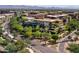 A stunning full exterior view of the residential building showcasing lush greenery and modern architecture at 7121 E Rancho Vista Dr # 5011, Scottsdale, AZ 85251