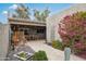 Cozy backyard with decorative landscaping and covered patio at 7126 N Via Nueva --, Scottsdale, AZ 85258