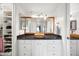 Bright bathroom with dual sinks, vanity storage and modern fixtures at 7126 N Via Nueva --, Scottsdale, AZ 85258