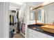 Bathroom with walk-in closet storage featuring adjustable shelving at 7126 N Via Nueva --, Scottsdale, AZ 85258