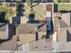 Top-down aerial view of the property showing the roof, backyard, and surrounding landscape at 840 E Hackamore St, Mesa, AZ 85203