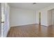 Bright bedroom with laminate flooring, neutral walls, and lots of sunlight at 840 E Hackamore St, Mesa, AZ 85203