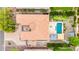 Overhead view of a property featuring a backyard pool, mini-golf, an outdoor fireplace and beautiful landscaping at 8418 W Louise Ct, Peoria, AZ 85383