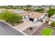 Aerial view of a beautiful home with a circular driveway, mature trees and great curb appeal at 8418 W Louise Ct, Peoria, AZ 85383