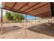 Covered patio area that offers a space for outdoor relaxation and enjoying the backyard at 1004 S Ironwood Dr, Apache Junction, AZ 85120