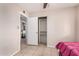 View into bedroom showing a closet with a single door and tile flooring at 1004 S Ironwood Dr, Apache Junction, AZ 85120