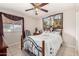 Comfortable bedroom with natural light and ceiling fan at 1004 S Ironwood Dr, Apache Junction, AZ 85120