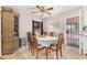 Charming dining area with tiled floors, and decorative chandelier at 1004 S Ironwood Dr, Apache Junction, AZ 85120