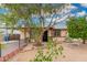 Charming single-story home with mature tree and desert landscaping in a friendly neighborhood at 1004 S Ironwood Dr, Apache Junction, AZ 85120