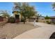 Charming desert landscape with a two-story home and a desert landscape at 10212 E Betony Dr, Scottsdale, AZ 85255