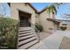 Inviting front entry featuring a set of stairs and beautiful desert landscaping at 10212 E Betony Dr, Scottsdale, AZ 85255