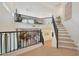 Bright living room with open floorplan and black metal railing at 10212 E Betony Dr, Scottsdale, AZ 85255