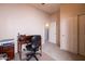 Office with a ceiling fan, a desk, and closet at 1054 W Park Ave, Gilbert, AZ 85233