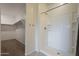 Bathroom with shower stall and walk-in closet at 10705 E Sunflower Ct, Florence, AZ 85132