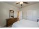 Bedroom featuring a bed and dresser at 10705 E Sunflower Ct, Florence, AZ 85132