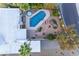 Aerial view showcasing a backyard with a pool, hot tub, lounge chairs, and desert landscaping at 11041 N 44Th St, Phoenix, AZ 85028