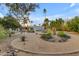 Expansive backyard with pool, lounge chairs and desert landscaping at 11041 N 44Th St, Phoenix, AZ 85028