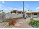 Backyard featuring a covered patio, desert landscaping and block fence at 11041 N 44Th St, Phoenix, AZ 85028