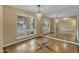 Dining room with large mirror, tile floor, and a stylish chandelier at 11041 N 44Th St, Phoenix, AZ 85028