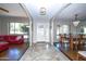 Open-concept foyer with archways leading to the living and dining rooms with plenty of natural light at 11041 N 44Th St, Phoenix, AZ 85028