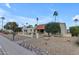 View of the home's front yard, with desert landscaping and charming walkway at 11041 N 44Th St, Phoenix, AZ 85028