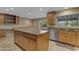 Well-lit kitchen featuring a functional island, stainless steel appliances at 11041 N 44Th St, Phoenix, AZ 85028