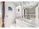 Elegant bathroom with a bright vanity mirror, a toilet, and a shower at 11139 W Cameo Dr, Sun City, AZ 85351