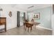 Cozy dining room with natural light, and a charming table set for two at 11139 W Cameo Dr, Sun City, AZ 85351