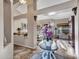 Bright foyer showcasing decorative arches, tile flooring and an entryway table with elegant decor at 11256 S Hopi Dr, Goodyear, AZ 85338