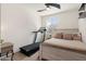 Cozy bedroom featuring neutral walls, carpet, ceiling fan and furniture at 12038 W Briles Rd, Peoria, AZ 85383