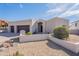 Contemporary stucco home with a two-car garage and desert landscaping at 1219 E Seminole Dr, Phoenix, AZ 85022